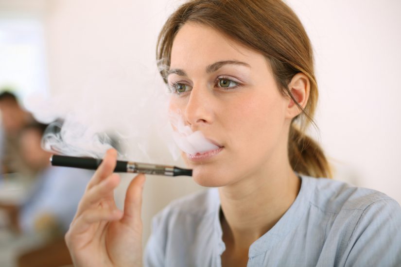 Man smoking electric cigarette