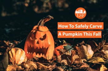 how to safely carve a pumpkin - jackolantern in fall leaves