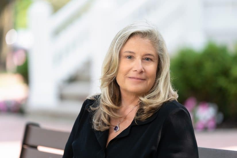 attorney ellen hobbs hirshman sitting outside on chardon square bench